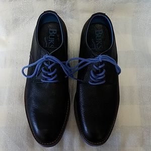 Black leather and blue oxfords